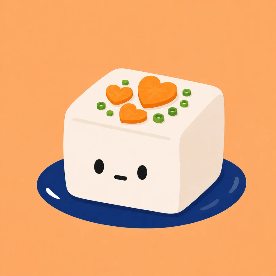 A cute tofu character on a navy plate with myoga and sesame.